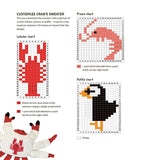 A printed page showing several pixel-art style charts and patterns for a custom crab sweater, including a penguin, crab, and shrimp.
