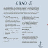 A printed recipe card titled 'CRAB' with illustrated crabs, ingredient lists, tension instructions, and measurements on a pale blue background.