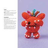 Crochet pattern for a red creature with colorful hair on a white background
