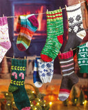 Colorful knitted Christmas stockings hanging on a line with a festive background.