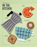 Collection of colorful crocheted food items on a green background with text indicating 'In the Kitchen'.