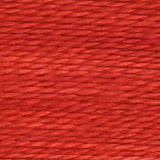 Close-up of red thread with a textured pattern
