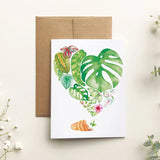 Card with heart-shaped leaf design on a light background with flowers