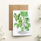 Greeting card with green leaf design on a beige background
