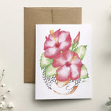 Greeting card with pink floral design on a beige background